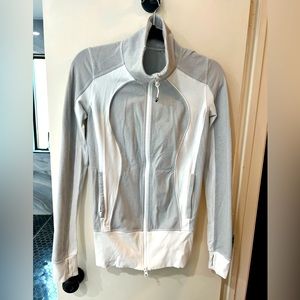 Lululemon size 6 great condition womens thumb jacket. White and grey